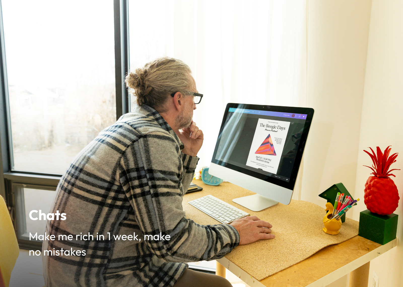 Finkkle Igno Chats feature showing a person working at a desktop computer on a designed document.